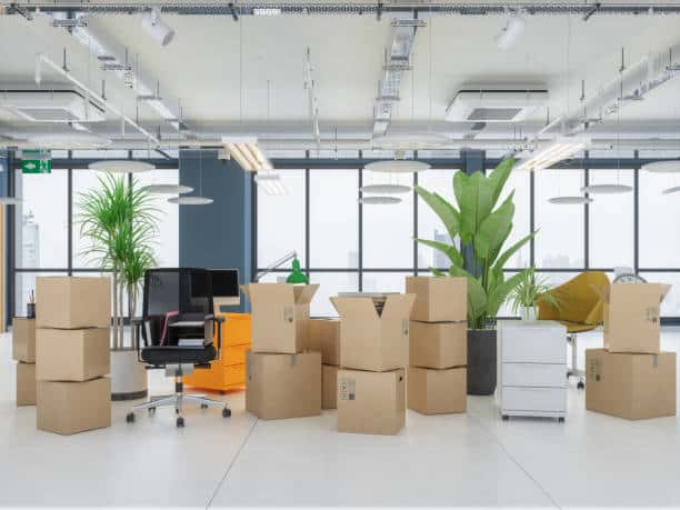 carton boxes in empty office. moving office concepts. carton boxes in empty office. moving office concepts.